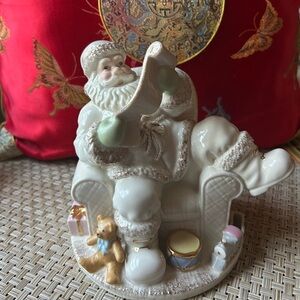 Lenox retired Santa checking his list.